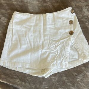 White linen skirt with cork buttons